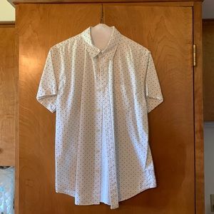 Arizona Jean Company white shirt with small black polka dots.